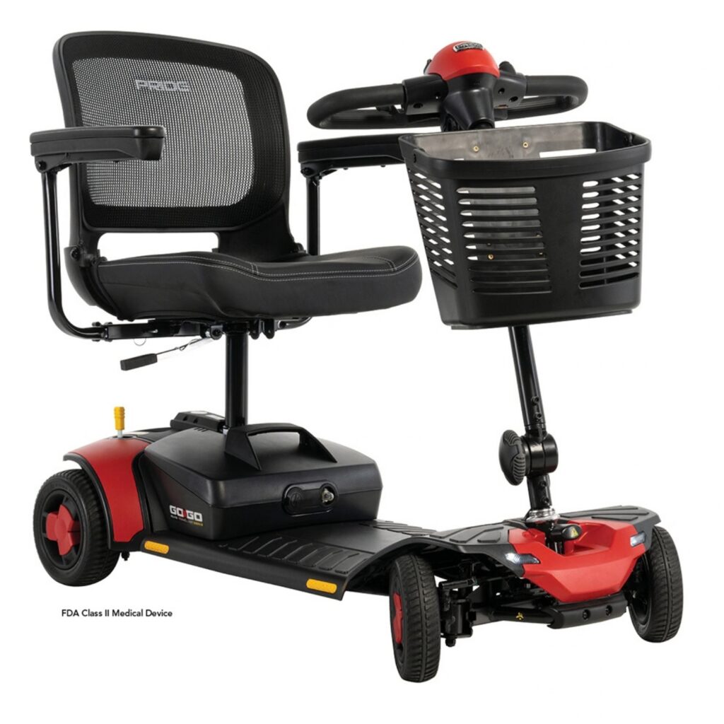 A red and black Go Go Elite Traveller Gen 3 Scooter with four wheels, a mesh back seat, and a front basket.