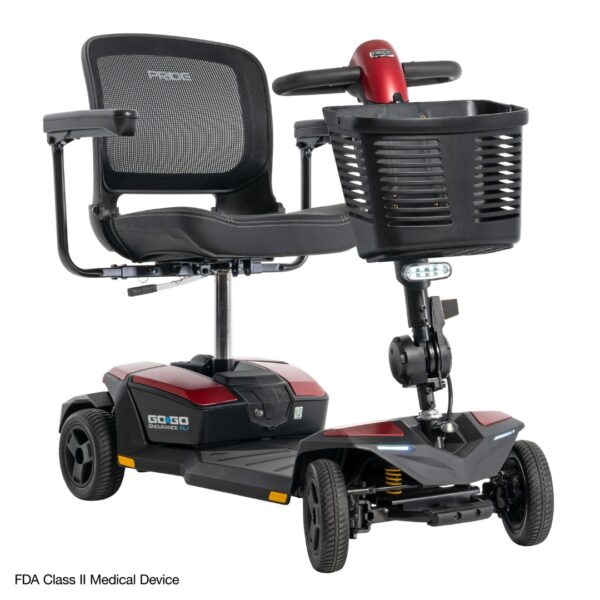 A four-wheel mobility scooter with a black seat, mesh backrest, armrests, front basket, and control handles. The device is labeled Go Go® Endurance AL+ 4-Wheel Scooter.