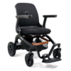 The Ally Power Wheelchair is a modern black electric wheelchair with armrests, joystick control, padded seat, footrest, and a storage basket underneath.