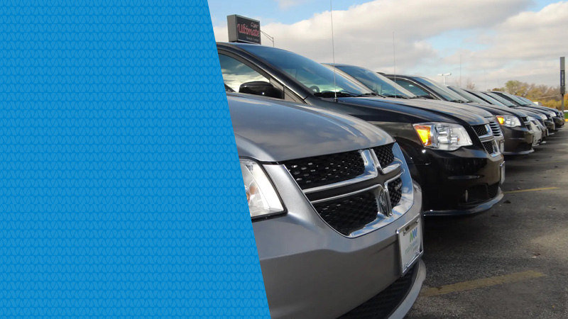 extensive inventory, view of parking lot filled with accessible vans