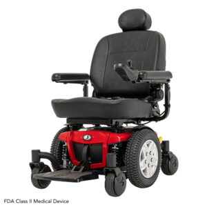 The Jazzy 600ES Power Wheelchair in red and black features a padded seat, headrest, armrests, footrest, large rear wheels, and small front casters for smooth mobility.