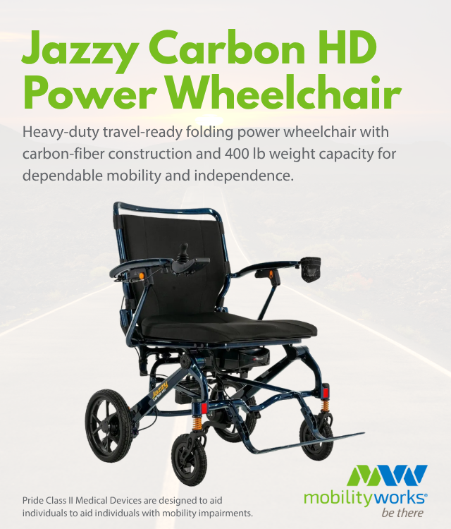A black folding power wheelchair with carbon-fiber frame, footrests, and armrests is displayed on a plain background with Jazzy Carbon HD Power Wheelchair text above.
