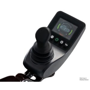 Close-up of the Jazzy Carbon 27 Power Wheelchair’s black joystick controller with a display screen showing battery and speed indicators.