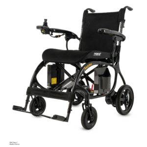 The Jazzy Carbon 27X Power Wheelchair is a black motorized wheelchair featuring a joystick controller on the armrest, padded seat, and footrests, designed to provide enhanced mobility assistance.