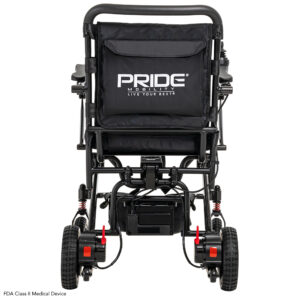 Rear view of a black Jazzy Carbon Travel Power Wheelchair, featuring lightweight design, visible wheels, suspension, electronic components, and Pride Mobility branding on the backrest.