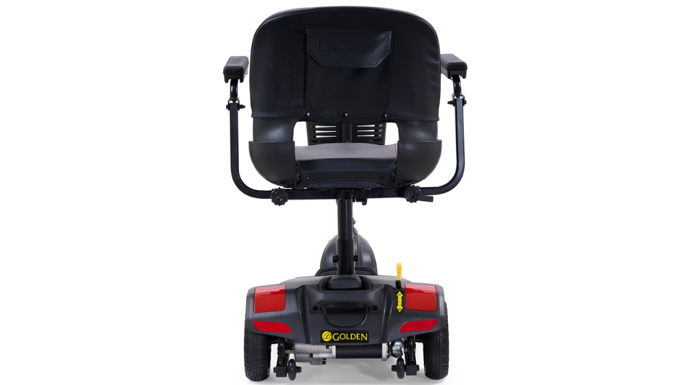 Rear view of a black BuzzAround LT 3-Wheel Scooter with a cushioned seat, armrests, and three wheels, featuring the brand name Golden on the back.