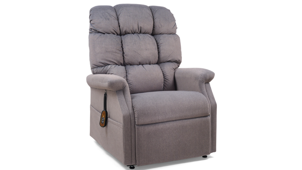 A Cambridge Lift Chair in gray upholstery featuring a high cushioned backrest, padded armrests, and a remote control mounted on the left side.