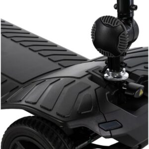 Close-up of the Pride Go Go Ultra X 4-Wheel Gen 3 scooter’s black deck and steering column, highlighting the textured footrest area, part of a wheel, and a circular component mounted near the handlebar stem.