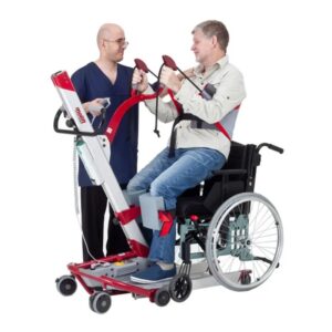 In a clinical setting, a healthcare professional efficiently uses the Molift Quick Raiser 2 to assist a man in a wheelchair, ensuring his comfort and safety during the transfer.