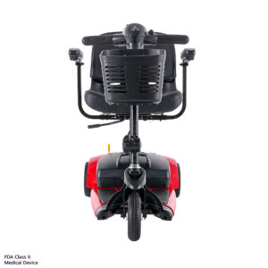 Rear view of a red and black Venture 3-Wheel Scooter with armrests, showing the backrest, handles, and seat. The FDA Class II medical device label appears in the bottom left corner.