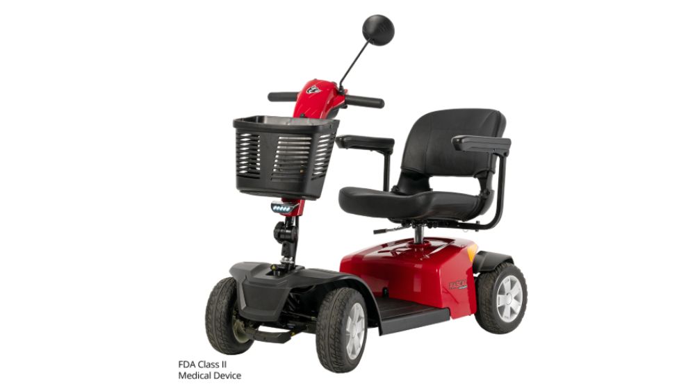 Conquest 4-Wheel Scooter in red, featuring a front basket, black seat with armrests, and a rearview mirror, displayed on a white background with the FDA Class II medical device label visible.