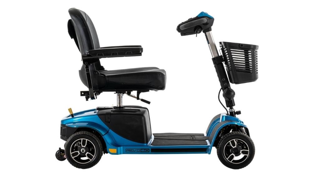 The Revo® 2.0 4-Wheel Scooter in blue, featuring a black padded seat, armrests, and a front basket, is shown from the side against a white background. This model combines robust design with enhanced stability characteristic of the Revo 2.0 series while retaining a sleek appearance.