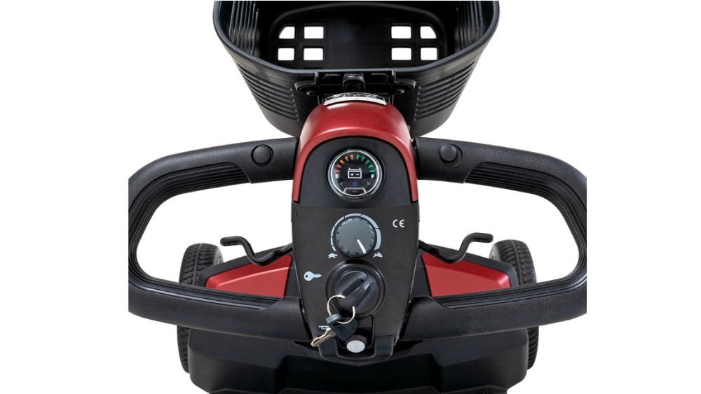 Close-up view of a Go Go® Endurance Li 4-Wheel Scooter’s control panel, showcasing the key, speed dial, and battery indicator, set against a plain white background.
