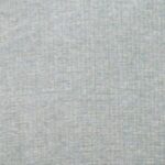 A close-up of the Cloud with Twilight Lift Chair’s light gray textured fabric, featuring a subtle woven pattern and cloud-like twilight hues softly blended into its threads.