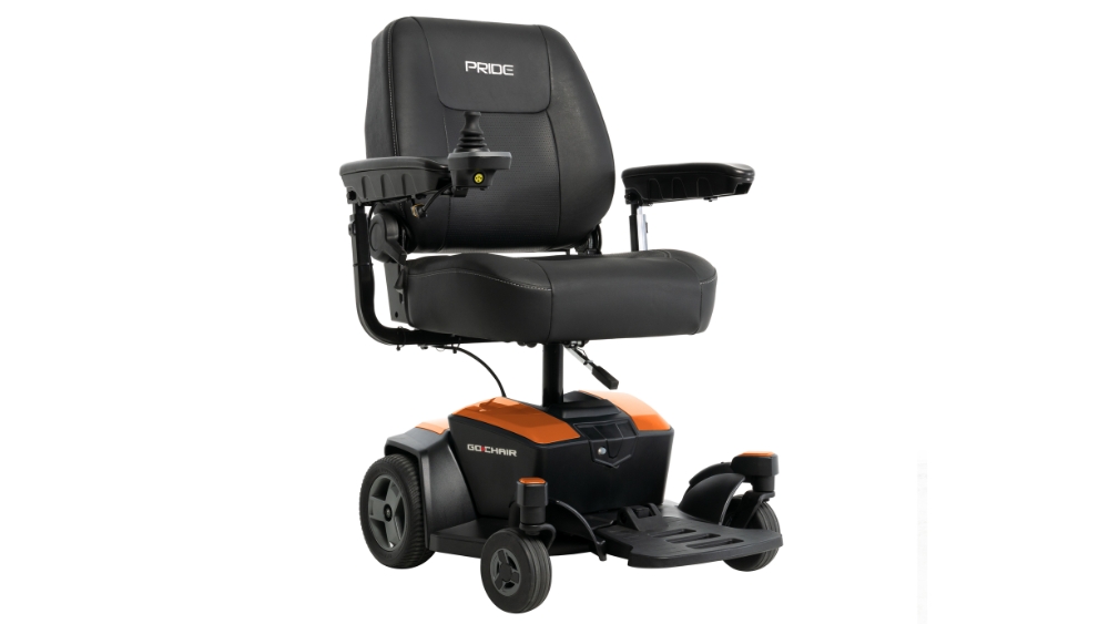 A Go Chair Power Wheelchair in black and orange, featuring a padded seat, joystick control on the armrest, and four wheels.