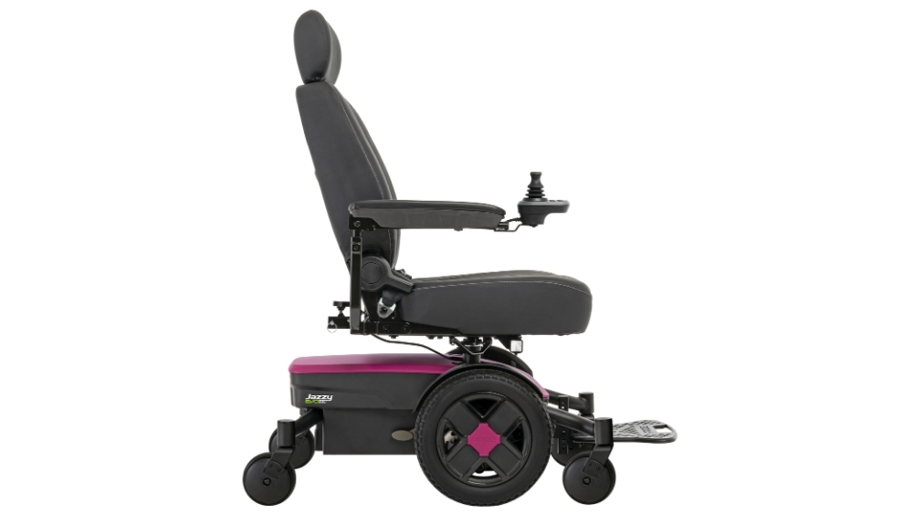 Side view of a black Jazzy EVO 613 Li Power Wheelchair with a pink accent, adjustable headrest, armrests, joystick control, and footrest, against a white background.