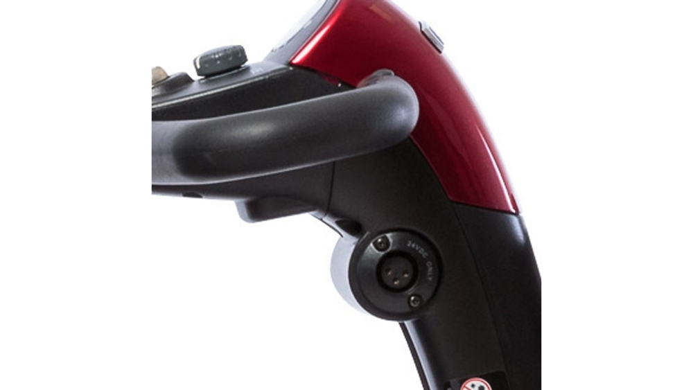 Close-up of a black and red handlebar with an attached power port, part of the Go Go™ Sport 3-Wheel Scooter.