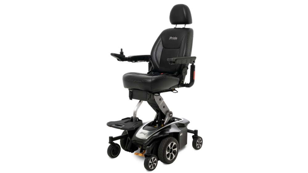 Black Jazzy Air® 2 Power Wheelchair with a padded seat, right-arm joystick, adjustable headrest, and four wheels, displayed against a white background.