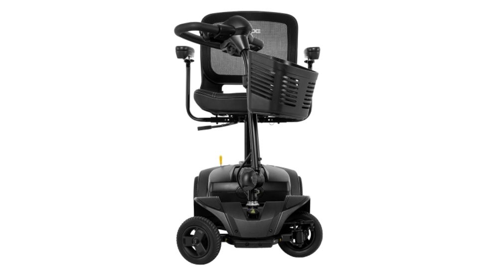 A black Go Go™ Elite Traveller® 2 4-Wheel Scooter with a mesh backrest and a small front basket, shown from the front against a white background.