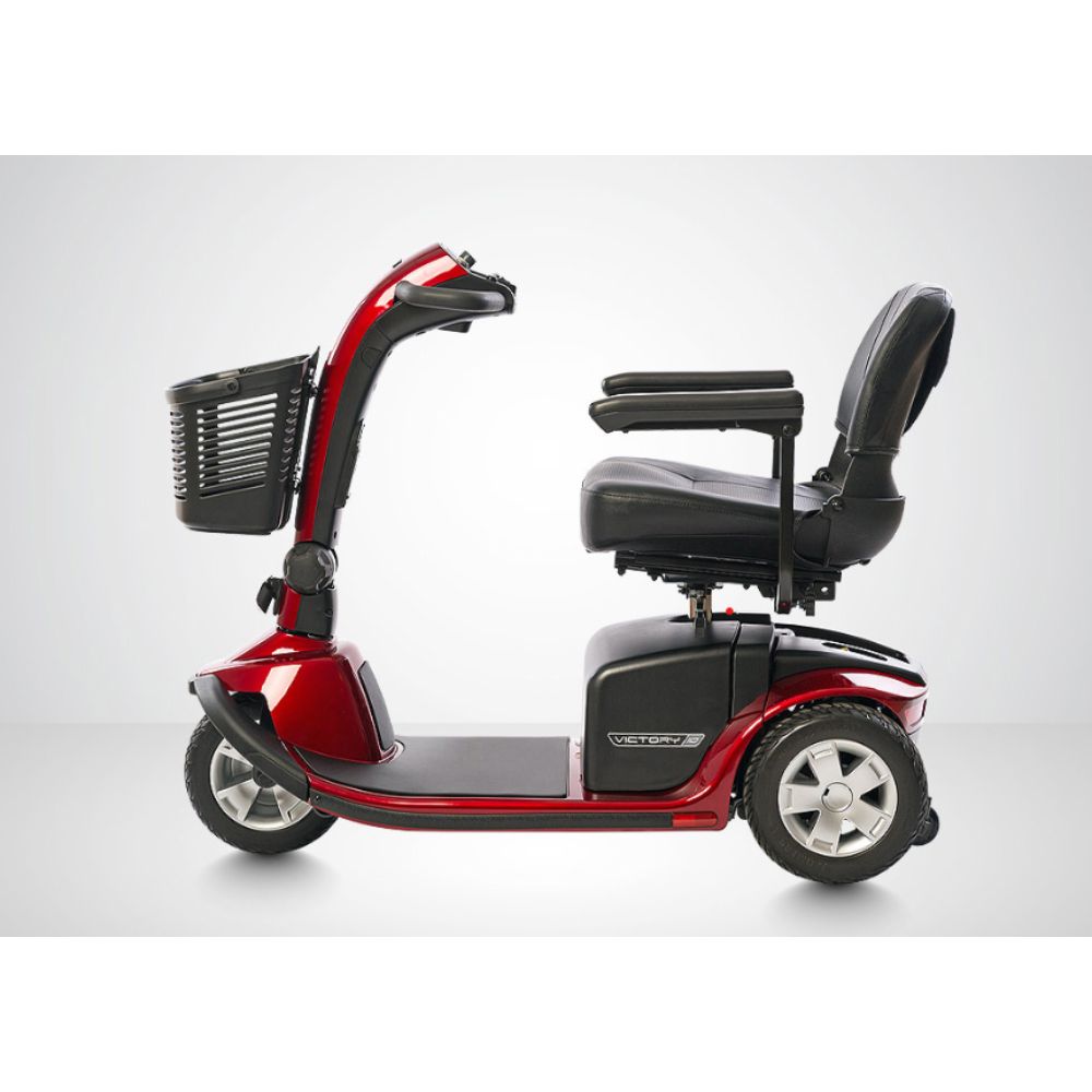 Victory 10 3-Wheel Scooter in red, featuring a front basket, black seat with armrests, and silver wheels, displayed in profile against a plain background.