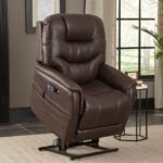 The VivaLift! Elegance 2 Lift Chair features dark brown leather with visible stitching, a metal base, and is shown in a living room by a window and side table for an elegant touch.