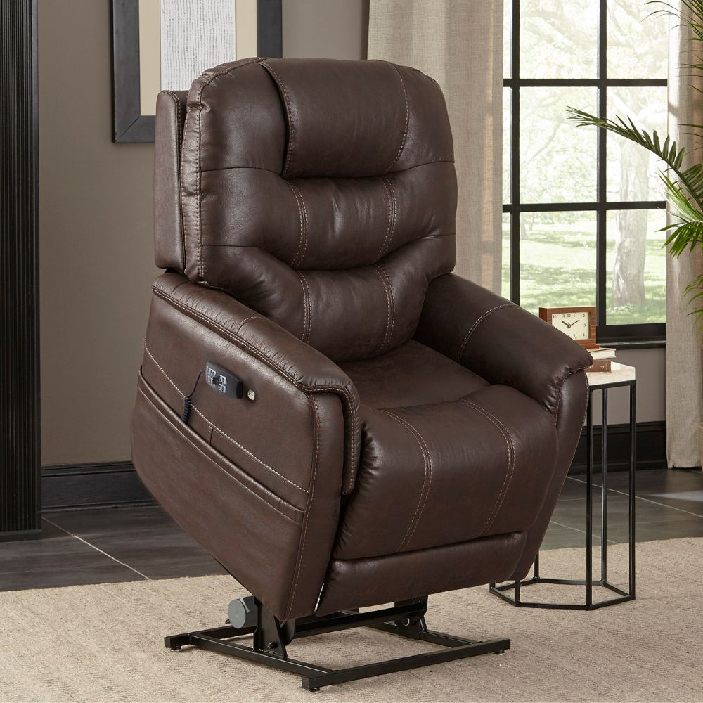 The VivaLift! Elegance 2 Lift Chair features dark brown leather with visible stitching, a metal base, and is shown in a living room by a window and side table for an elegant touch.