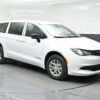 White Chrysler Voyager with BraunAbility Rear Entry Manual Fold Out conversion