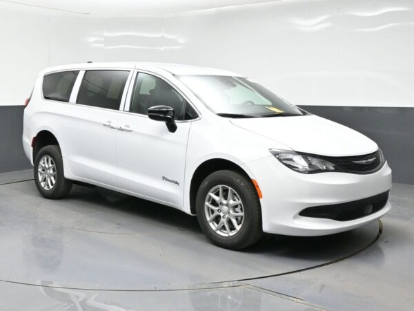 White Chrysler Voyager with BraunAbility Rear Entry Manual Fold Out conversion