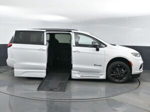 White Chrysler Pacifica with BraunAbility Side Entry Automatic Fold Out conversion