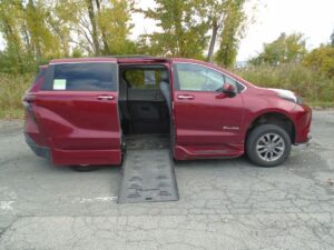 Red Toyota Sienna with BraunAbility Side Entry Automatic Fold Out conversion