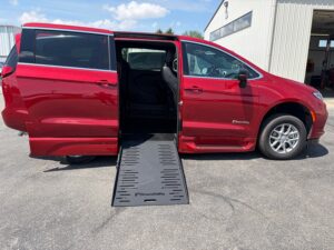 Red Chrysler Pacifica with BraunAbility Side Entry Automatic Fold Out conversion