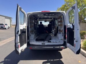 White Ford Transit with Driverge Side Entry Automatic Fold Out conversion