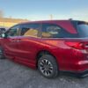 Red Honda Odyssey with BraunAbility Side Entry Automatic In Floor conversion
