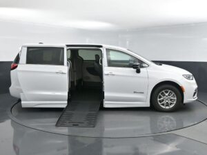 White Chrysler Pacifica with BraunAbility Side Entry Automatic Fold Out conversion