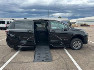 Black Toyota Sienna with BraunAbility Side Entry Automatic Fold Out conversion