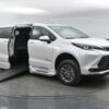 White Toyota Sienna with BraunAbility Side Entry Automatic Fold Out conversion