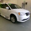 White Dodge Grand Caravan with Vantage Mobility Side Entry Manual In Floor conversion