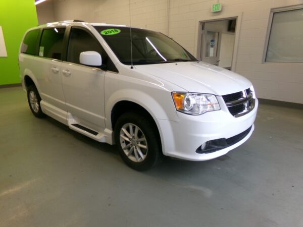 White Dodge Grand Caravan with Vantage Mobility Side Entry Manual In Floor conversion