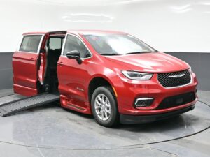 Red Chrysler Pacifica with BraunAbility Side Entry Automatic Fold Out conversion