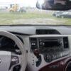 White Toyota Sienna with BraunAbility Side Entry Automatic Fold Out conversion