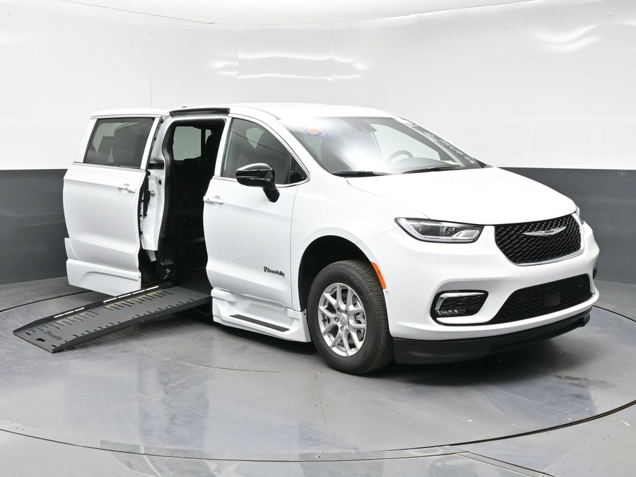 White Chrysler Pacifica with BraunAbility Side Entry Automatic Fold Out conversion