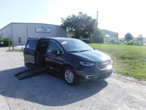 Blue Chrysler Pacifica with BraunAbility Side Entry Automatic Fold Out conversion