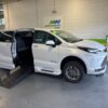 White Toyota Sienna with BraunAbility Side Entry Automatic Fold Out conversion
