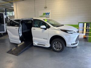 White Toyota Sienna with BraunAbility Side Entry Automatic Fold Out conversion