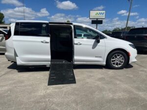 White Chrysler Voyager with Driverge Side Entry Automatic Fold Out conversion