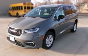 Grey Chrysler Pacifica with BraunAbility Rear Entry Manual Fold Out conversion