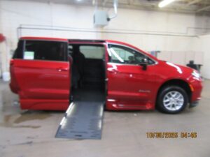 Red Chrysler Pacifica with BraunAbility Side Entry Automatic Fold Out conversion