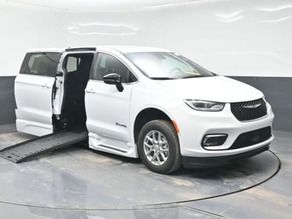 White Chrysler Pacifica with BraunAbility Side Entry Automatic Fold Out conversion