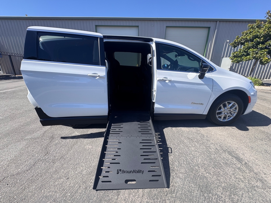 White Chrysler Pacifica with BraunAbility Side Entry Manual Fold Out conversion