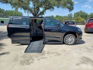 Black Chrysler Voyager with BraunAbility Side Entry Automatic Fold Out conversion